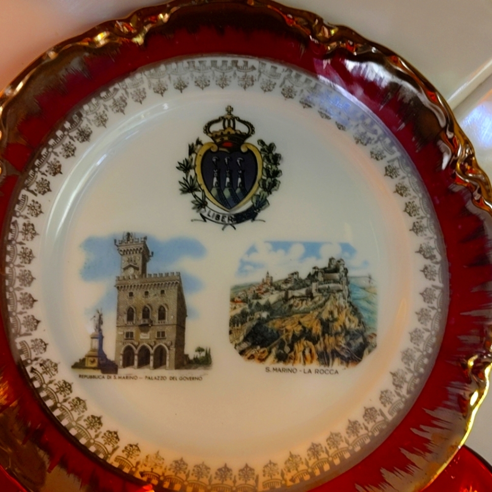Decorative Plate with Red and Gold Accents